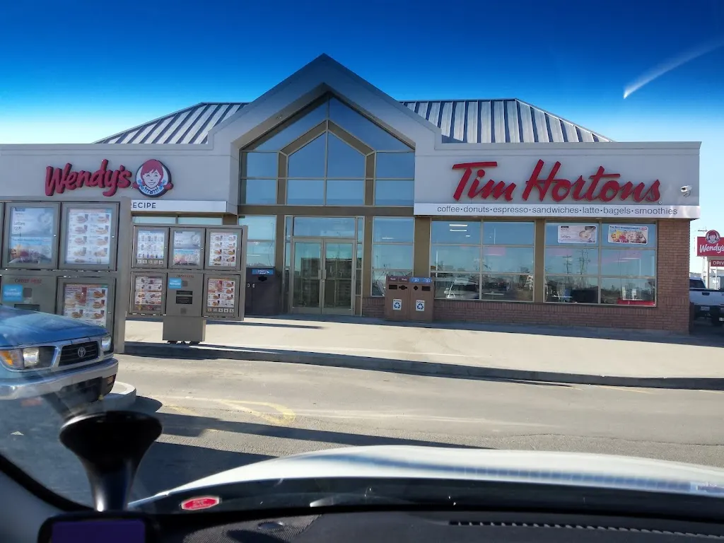 Tim Hortons storefront and interior at 100-139 Leva Ave, Red Deer, AB