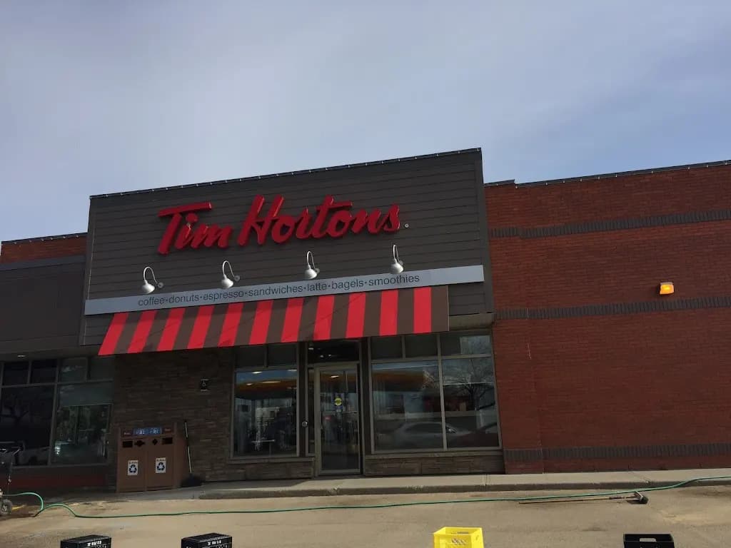 Tim Hortons storefront and interior at 2 Hebert Road, St Albert, AB