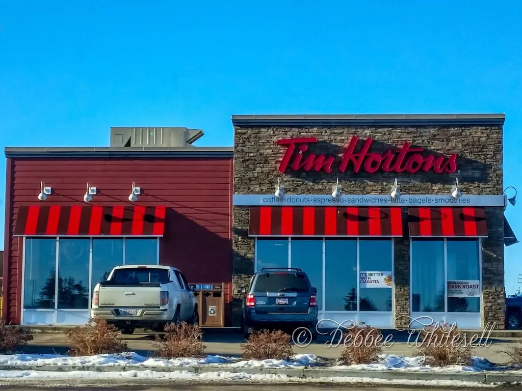 Tim Hortons storefront and interior at 11307 100th St, Westlock, AB
