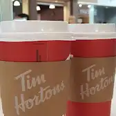 Tim Hortons storefront and interior at 629 - 5000 Canoe Pass Way, Delta, BC