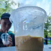 Tim Hortons storefront and interior at 261 Bernard Avenue, Kelowna, BC
