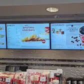 Tim Hortons storefront and interior at 5717 Main St, Oliver, BC