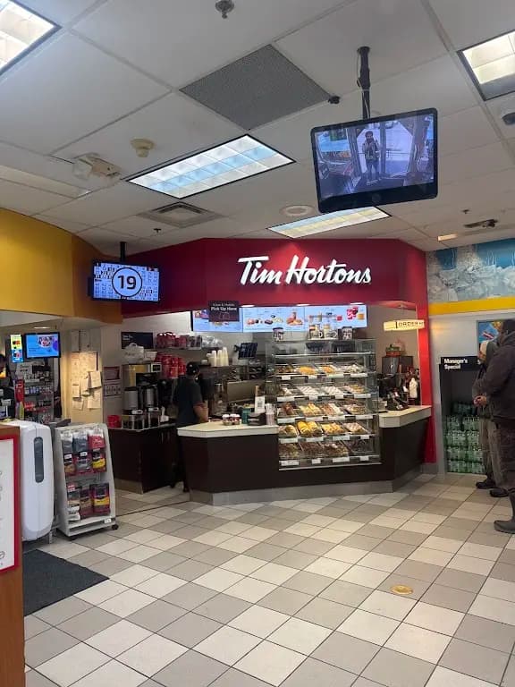 Tim Hortons storefront and interior at 6525 Oak St, Vancouver, BC