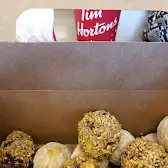 Tim Hortons storefront and interior at 1655 18th St, Brandon, MB