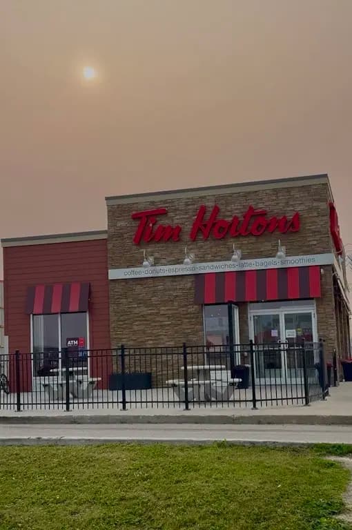 Tim Hortons storefront and interior at Hwy 75 South, Morris, MB
