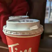 Tim Hortons storefront and interior at Hwy 75 South, Morris, MB