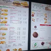 Tim Hortons storefront and interior at 25 Donwood Dr, Winnipeg, MB