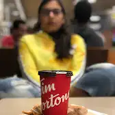 Tim Hortons storefront and interior at 240 Graham Ave, Winnipeg, MB