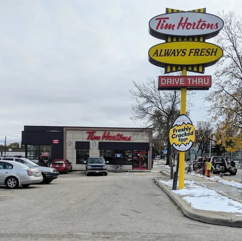 Tim Hortons storefront and interior at 255 Maryland St, Winnipeg, MB
