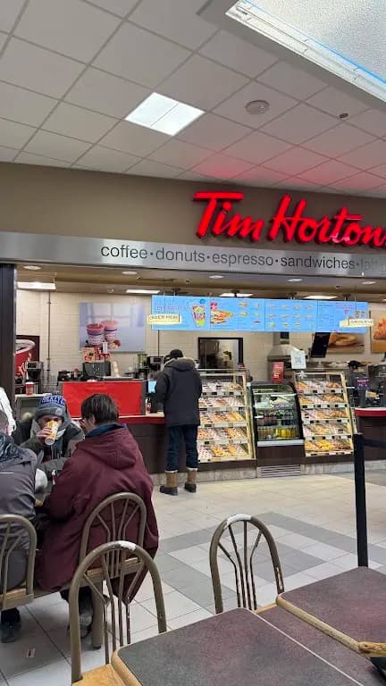 Tim Hortons storefront and interior at 333 St Marys Ave, Winnipeg, MB