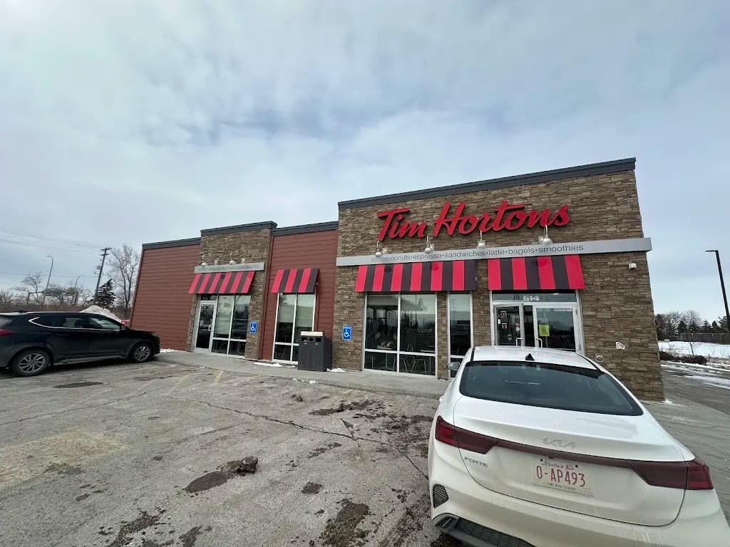 Tim Hortons storefront and interior at 614 Lagimodiere Blvd, Winnipeg, MB