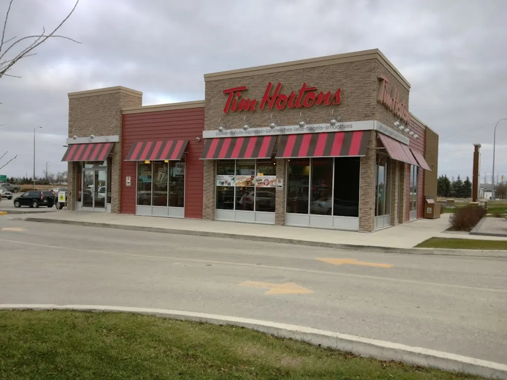Tim Hortons storefront and interior at 935 Headmaster Row, Winnipeg, MB