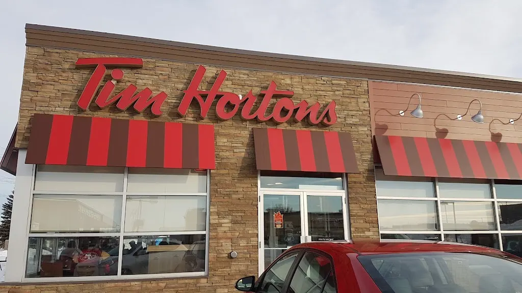 Tim Hortons storefront and interior at 1139 Gateway Rd, Winnipeg, MB