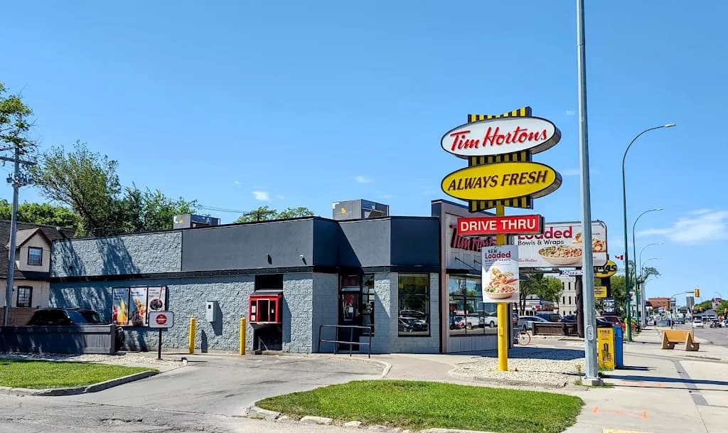 Tim Hortons storefront and interior at 1146 Portage Ave, Winnipeg, MB