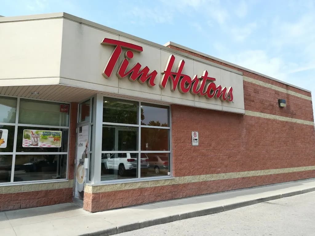 Tim Hortons storefront and interior at 1590 Notre Dame, Winnipeg, MB