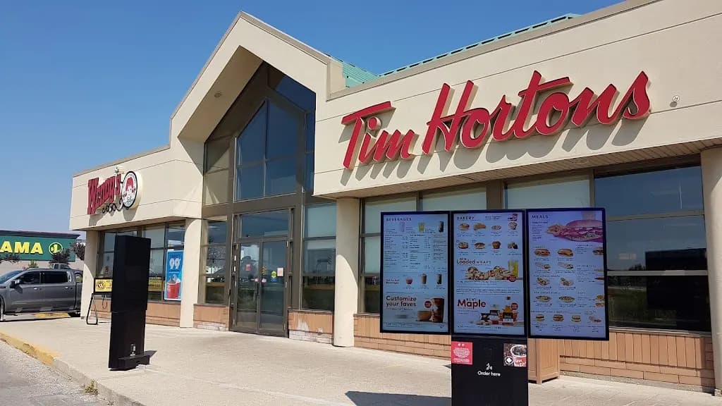 Tim Hortons storefront and interior at 1609a Kenaston Blvd, Winnipeg, MB