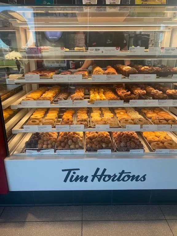 Tim Hortons storefront and interior at 2117 Ness Ave, Winnipeg, MB