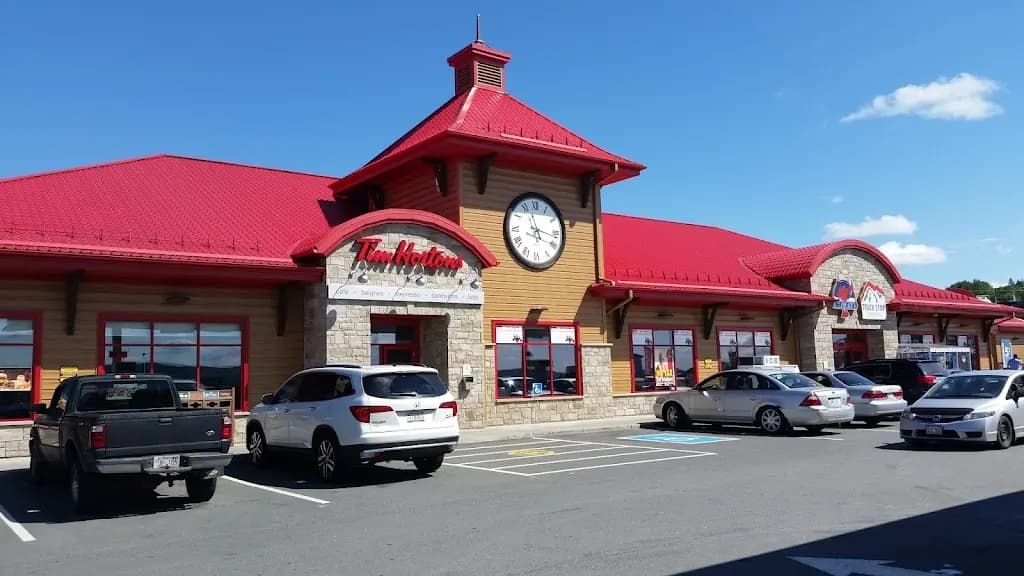 Tim Hortons storefront and interior at 100 Grey Rock Rd, Edmundston, NB