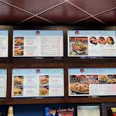 Tim Hortons storefront and interior at 100 Grey Rock Rd, Edmundston, NB