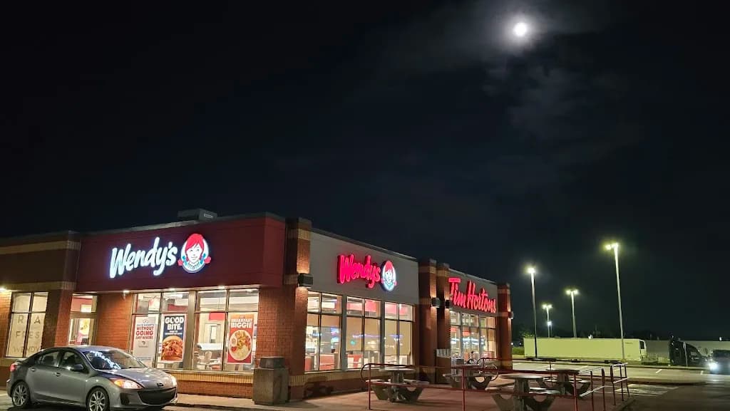 Tim Hortons storefront and interior at 118 South Albion Street, Amherst, NS