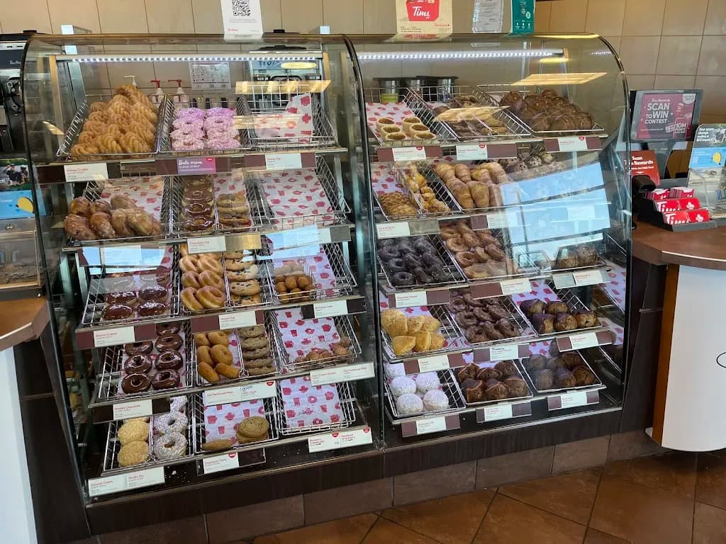 Tim Hortons storefront and interior at 311 Bell Blvd, Goffs, NS
