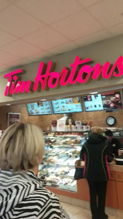 Tim Hortons storefront and interior at 45 Weatherbee Rd, Sydney, NS