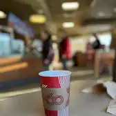 Tim Hortons storefront and interior at 318 Queen St East, Acton, ON