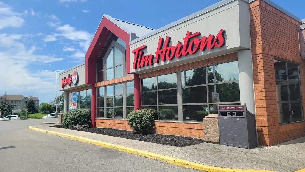Tim Hortons storefront and interior at 977 Golf Links Rd, Ancaster, ON