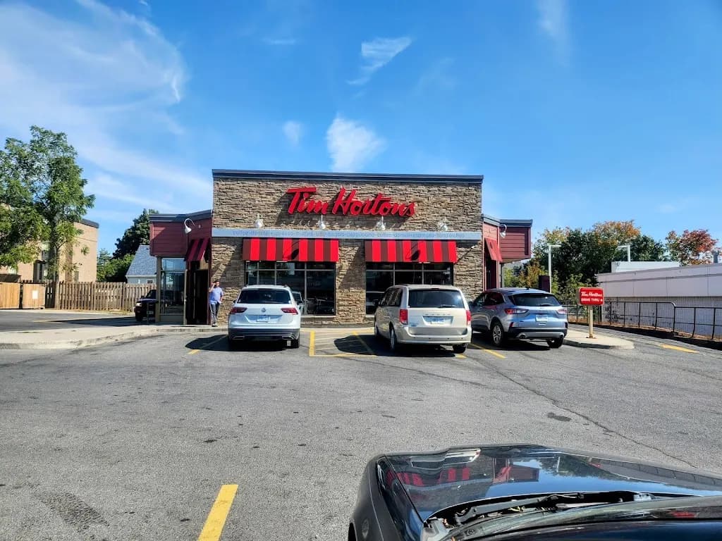 Tim Hortons storefront and interior at 169 North Front St, Belleville, ON
