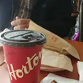 Tim Hortons storefront and interior at 95 Father Tobin Blvd, Brampton, ON