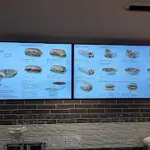 Tim Hortons storefront and interior at 675 Main Street North, Brampton, ON