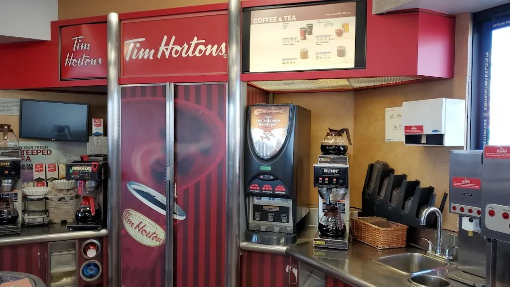 Tim Hortons storefront and interior at 7995 Kennedy Rd, Brampton, ON
