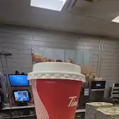 Tim Hortons storefront and interior at 10041 Mclaughlin Rd, Brampton, ON