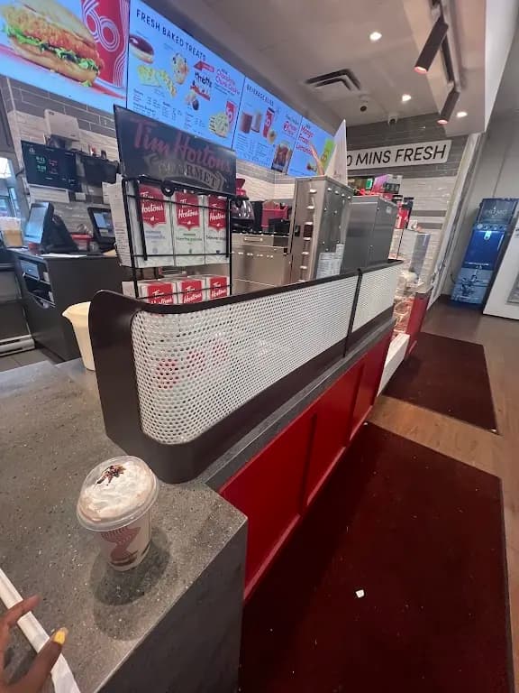 Tim Hortons storefront and interior at 300 St Andrews Dr, Cambridge, ON