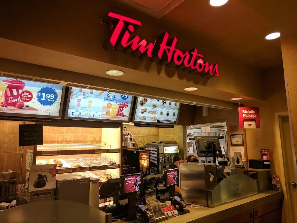 Tim Hortons storefront and interior at 106 Emma St, Chatham, ON