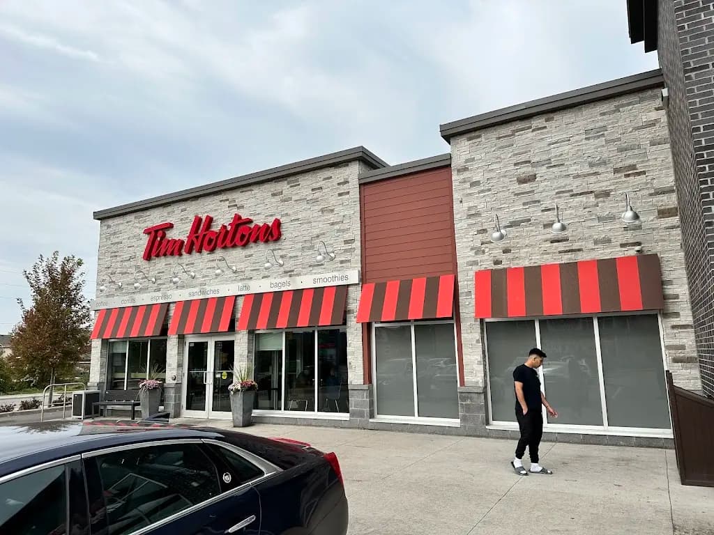 Tim Hortons storefront and interior at 304 Stone Rd, Guelph, ON