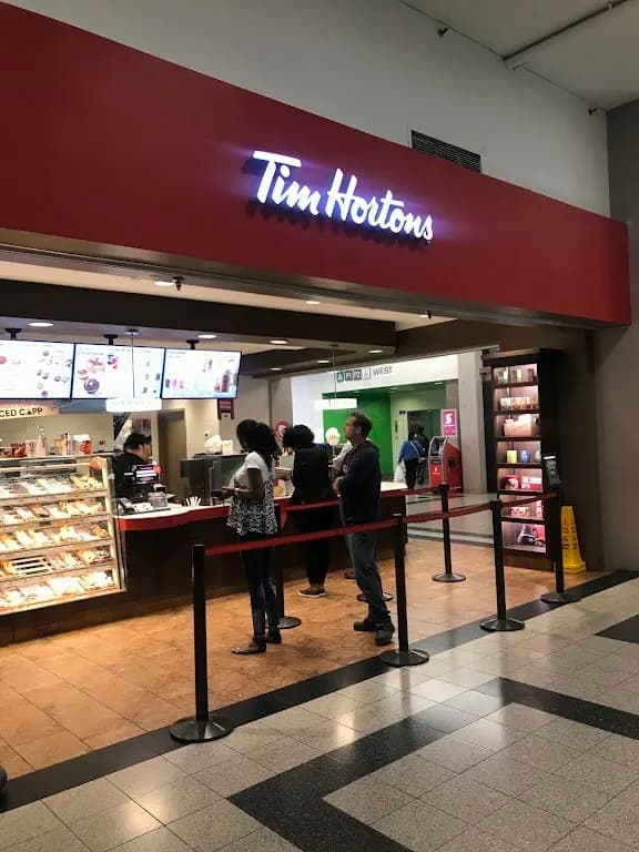Tim Hortons storefront and interior at 35 King St East, Hamilton, ON