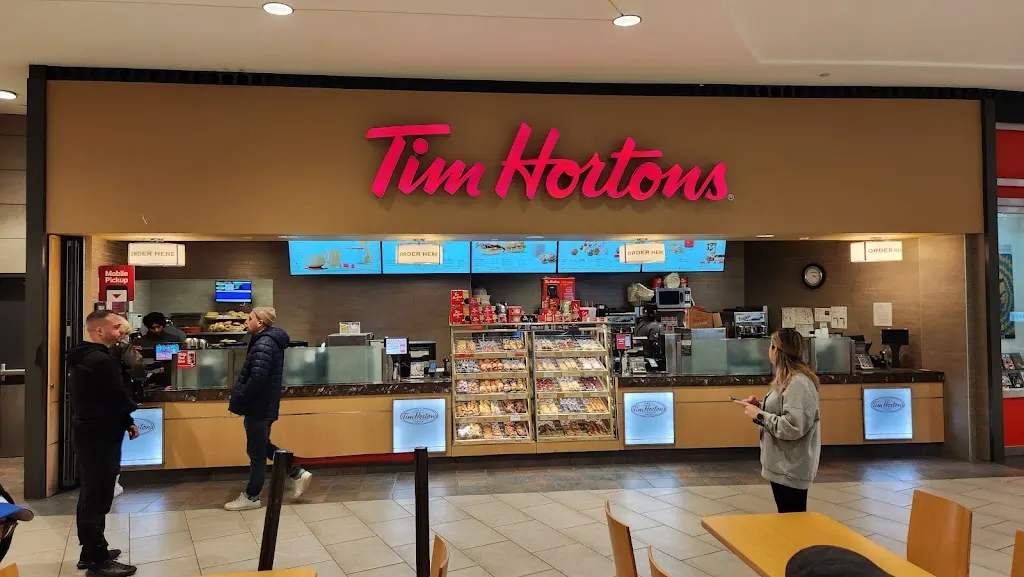 Tim Hortons storefront and interior at 999 Upper Wentworth, Hamilton, ON