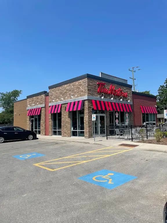 Tim Hortons storefront and interior at 13349 Ilderton Road, Ilderton, ON