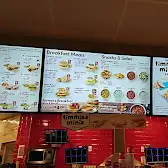 Tim Hortons storefront and interior at 4060 Carling Ave, Kanata, ON