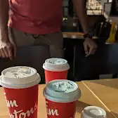 Tim Hortons storefront and interior at 4060 Carling Ave, Kanata, ON