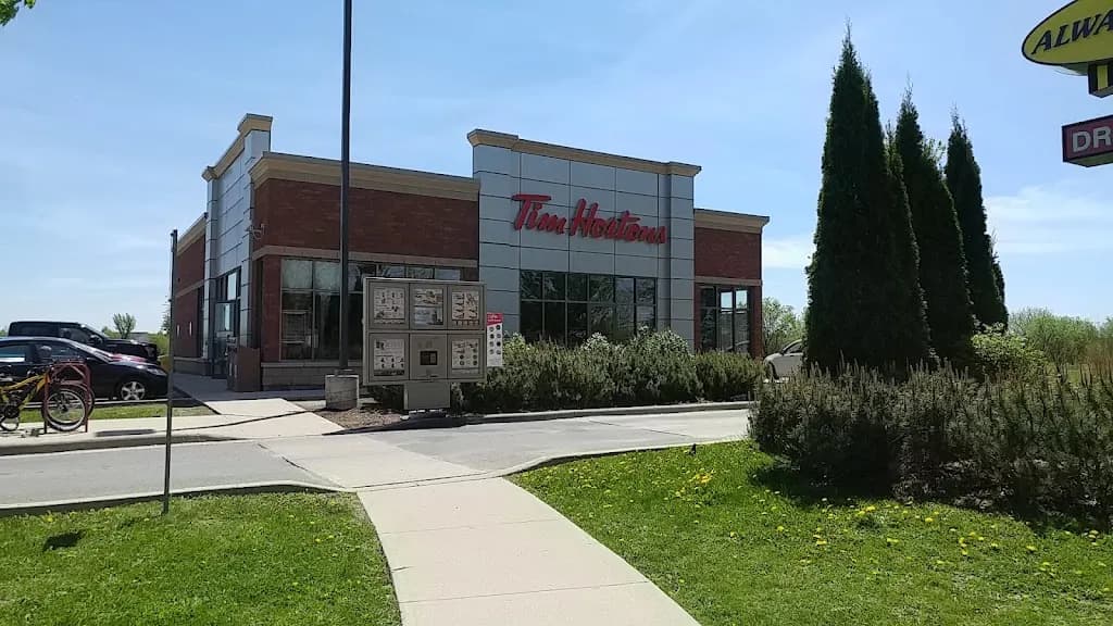 Tim Hortons storefront and interior at 111 Innovation Dr, Kingston, ON