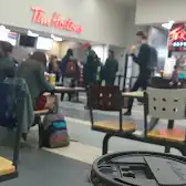 Tim Hortons storefront and interior at 284 Earl St, Kingston, ON