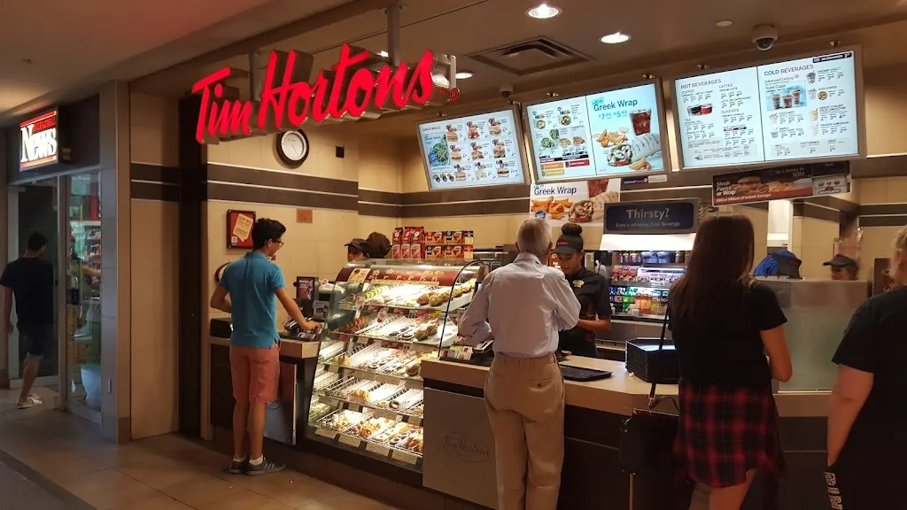 Tim Hortons storefront and interior at 2960 Kingsway Dr, Kitchener, ON