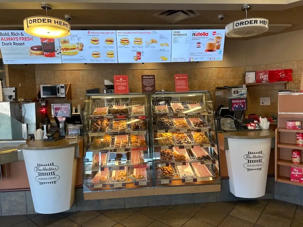 Tim Hortons storefront and interior at 1384 Wellington Rd, London, ON