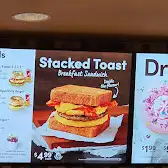 Tim Hortons storefront and interior at 5000 Hwy 7 E, Markham, ON