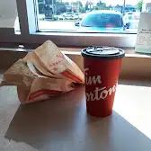 Tim Hortons storefront and interior at 433 Steeles Ave E, Milton, ON