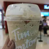 Tim Hortons storefront and interior at 100 City Centre Dr, Mississauga, ON