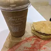 Tim Hortons storefront and interior at 100 City Centre Dr, Mississauga, ON