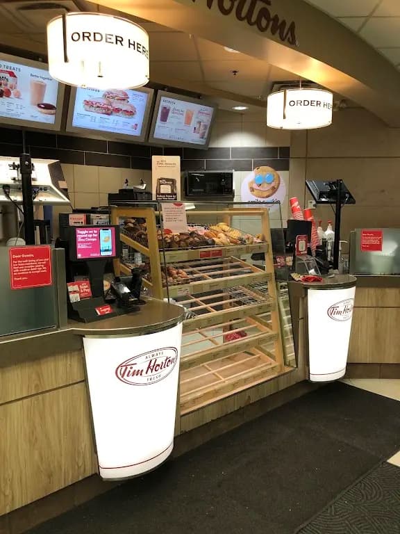 Tim Hortons storefront and interior at Hospital East Entrance - 100 Queensway W., Mississauga, ON